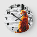 Search for orange tabby cat clocks Pets