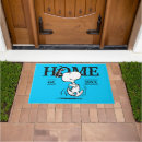 Search for peanuts doormats Charlie brown's dog