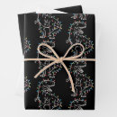 Search for dino christmas wrapping paper Santa dinosaur