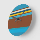 Search for brown and turquoise clocks Stripes