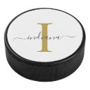 Search for gold hockey pucks Elegant
