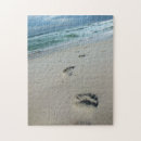 Search for footprints in the sand puzzles Water