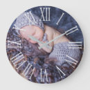 Search for large number clocks Contemporary