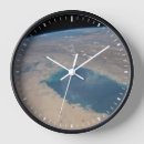 Search for curved clocks Earth