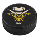 Search for vintage hockey pucks Cowboy