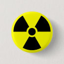 Search for radioactive round badges Warning