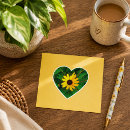 Search for black hearts on green stickers Yellow