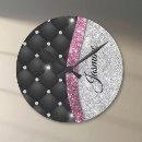 Search for silver and pink clocks For her