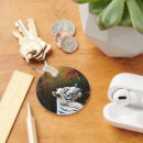 Search for tiger rounded key rings For her