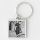 Search for black dress key rings Looking at camera