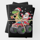 Search for dinosaur holiday wrapping paper Xmas