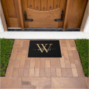 Search for black and gold doormats Letter