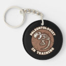 Search for fossils key rings Paleontologist