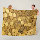 Search for gold coin blankets Money