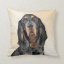 Search for black and tan cushions Dog