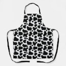 Search for cow pattern aprons Black