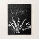 Search for black man puzzles White