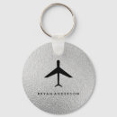 Search for flying plane key rings Airport