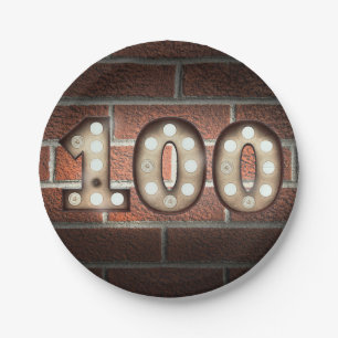 100th birthday marquee sign on brick wall paper plate