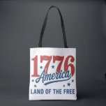 1776 America's 250th Anniversary Tote Bag<br><div class="desc">Celebrate this extra special milestone Independence day with an anniversary tote! This tote features the year 1776 in bold red letters with navy blue lettering that says "America land of the free."  Perfect for celebrating the 250th anniversary of America.</div>