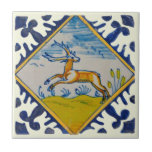 17th Century Delft Deer Handpainted Reproduction Tile<br><div class="desc">From around 1650, this tile features a bold border and a diamond framed deer. Available in 4.5 and 6 inch tiles as well as other items. Be sure to see our other Delft tiles - they look great when combined as a variety of mix and match accent tiles on a...</div>