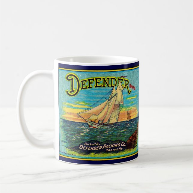 1910s Defender brand packing sailboat label Coffee Mug (Left)