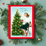 1920’s Vintage Lady Decorating Christmas Tree Holiday Card<br><div class="desc">1920’s Vintage Lady Decorating Christmas Tree Holiday Card.</div>