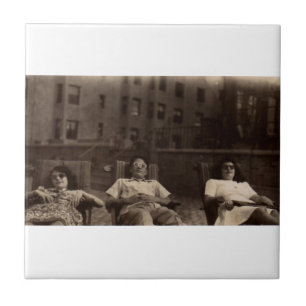 1940s three people relaxing on the roof tile