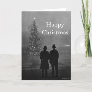 1948: Two policemen regard Christmas Tree Holiday Card