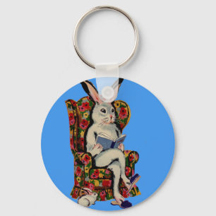 1950s seated big bunny reads story to baby bunny key ring