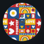 1980s Forever Love Pop Art Design Clock<br><div class="desc">A selection of boxes form a grid with heart, star and geometric shapes to create a vibrant pattern whose message is forever love. Inspired by the colours and retro pop art trend of the 1980s. Bright primary colours of red, blue and yellow with white shapes and text. Design by an...</div>