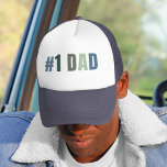 #1 Dad | Retro Father's Day Gift | Cool Trucker Hat<br><div class="desc">Give Dad the recognition he deserves with this classic “#1 DAD” retro-style trucker hat. Featuring bold typography with a soft vintage colour gradient, this cap is a fun and functional gift for the world’s coolest dad. Perfect for Father's Day, birthdays, or just because! 👑 Why It’s a Hit: • Lightweight...</div>