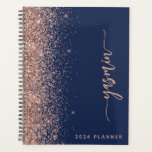 2024 Personalised Navy Blue Rose Gold Glitter Planner<br><div class="desc">Personalise this elegant modern design with your name in vertical rose pink signature handwriting script on a navy blue background trimmed with a rose gold faux glitter border. Add the year in sans serif font. (To keep the swashes at the beginning and end of the name, replace only the letters,...</div>