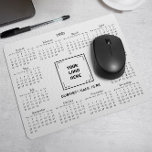 2025 CALENDAR CORPORATE BUSINESS LOGO WHITE MOUSE MAT<br><div class="desc">Design your own custom 2025 calendar mouse pad featuring your company logo. It's a perfect promotional giveaway or corporate gift for clients, vendors, employees, and other valued individuals. The calendar is elegantly displayed with a sophisticated serif font, ensuring clarity and professionalism, while the layout keeps all 12 months visible at...</div>