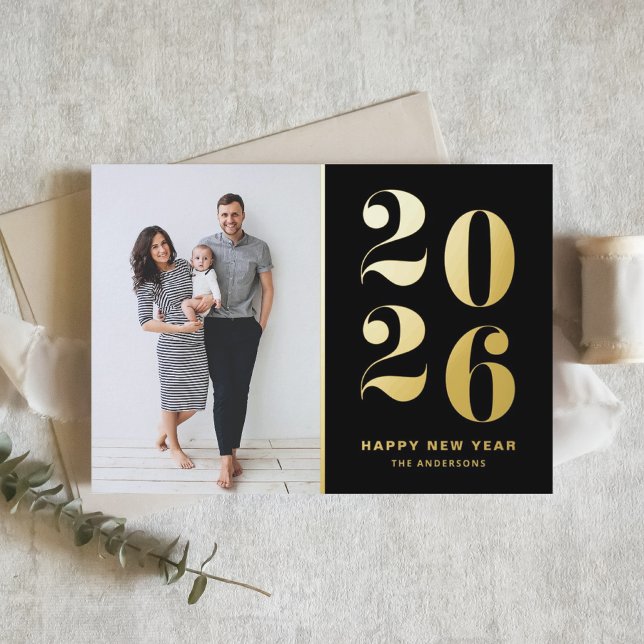 2025 Modern Bold Typography Black New Year Photo Foil Holiday Card (Customizable photo Happy New Year card featuring 2026 in gold foil and a black background.)