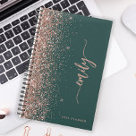 2025 Personalised Emerald Green Rose Gold Glitter Planner<br><div class="desc">Personalise this elegant modern design with your name in vertical rose pink signature handwriting script on an emerald green background trimmed with a rose gold faux glitter border. Add the year in sans serif font. (To keep the swashes at the beginning and end of the name, replace only the letters,...</div>