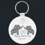 20th china wedding anniversary elephant key ring<br><div class="desc">20th china wedding anniversary elephant keyring. The design shows an elephant couple and reads, "20 Happy Anniversary". It can be personalised to include the names of the husband and wife and makes a fun and affordable gift for couples who are celebrating twenty years of marriage. Matching cards are also available...</div>