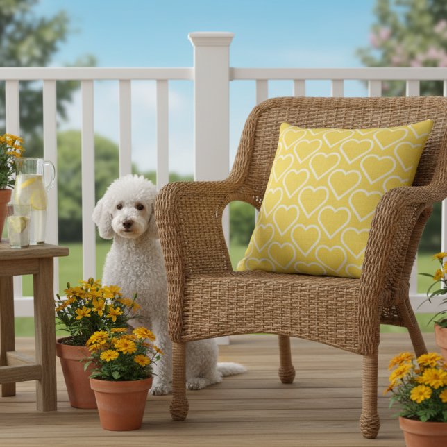 20x20 Yellow Outdoor Pillow with Cute Heart Print (Large yellow outdoor pillow with a heart print.)
