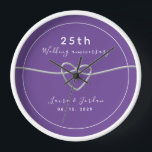 25th Wedding Anniversary Gift for Couple Clock<br><div class="desc">Celebrate 25 years of love with this simple,  modern,  and elegant personalised wall clock. Featuring a chic purple design,  this stunning anniversary gift is customised with your names,  special date,  and a charming silver rope heart symbolising your timeless love. A perfect keepsake to commemorate a quarter-century of beautiful memories.</div>