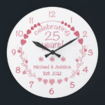 25th Wedding Anniversary Hearts Large Clock<br><div class="desc">Celebrate a milestone wedding anniversary with this gorgeous and elegant wall clock with a design featuring a wreath with red and pink hearts.</div>