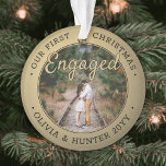 2 Photo 1st Christmas Engaged Elegant Faux Gold Ornament<br><div class="desc">Celebrate the joyful 1st holiday of your engagement with a custom 2 photo "Our First Christmas Engaged" black and gold round acrylic ornament. All text and images on this template are simple to personalise and can be different or the same on front and back. (IMAGE & TEXT DESIGN TIPS: 1)...</div>