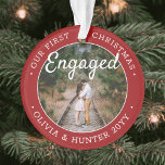 2 Photo 1st Christmas Engaged Elegant Red & White Ornament<br><div class="desc">Celebrate the joyful 1st holiday of your engagement with a custom 2 photo "Our First Christmas Engaged" round acrylic ornament. All text and images on this template are simple to personalise and can be different or the same on front and back. (IMAGE & TEXT DESIGN TIPS: 1) To adjust position...</div>