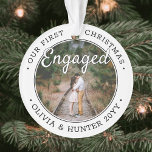 2 Photo 1st Christmas Engaged Modern Black & White Ornament<br><div class="desc">Celebrate the joyful 1st holiday of your engagement with a custom 2 photo "Our First Christmas Engaged" round acrylic ornament. All text and images on this template are simple to personalise and can be different or the same on front and back. (IMAGE & TEXT DESIGN TIPS: 1) To adjust position...</div>