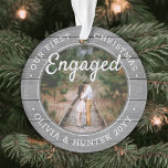 2 Photo Engagement First Christmas Faux Grey Wood Ornament<br><div class="desc">Celebrate the joyful 1st holiday of your engagement with a custom 2 photo "Our First Christmas Engaged" faux grey wood round acrylic ornament. All text and images on this template are simple to personalise and can be different or the same on front and back. (IMAGE & TEXT DESIGN TIPS: 1)...</div>