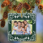 2 Photos Family Winter Greenery Christmas Ceramic Ornament<br><div class="desc">This dark green square Christmas ornament features an elegant white winter greenery illustration that frames the horizontal photo. The design offers space for 2 pictures,  one on the front and another on the back. Personalise this lovely keepsake ornament with your family name and the year.</div>