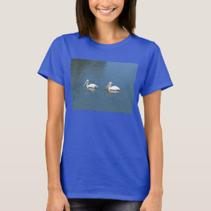 2 white pelicans on blue t-shirt