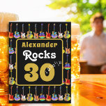 30th birthday Rock and Roll Guitar Personalized Card<br><div class="desc">Create the ultimate throwback celebration with this personalized black and gold rock and roll 30th birthday guitar greetings card, featuring bold modern gold typography customized with the name “Alexander Rocks 30.” Designed with groovy hippie typography and a vibrant retro 60s–70s vibe, this card brings instant rockstar flair to any milestone...</div>