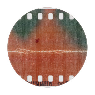 35mm filmstrip start, cool scratches. cutting board