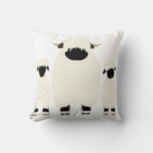 3 Valais Black nose sheep in a. row Cushion