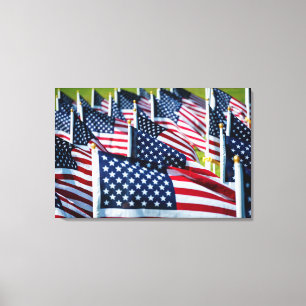 400 flags waving proudly in a field canvas print